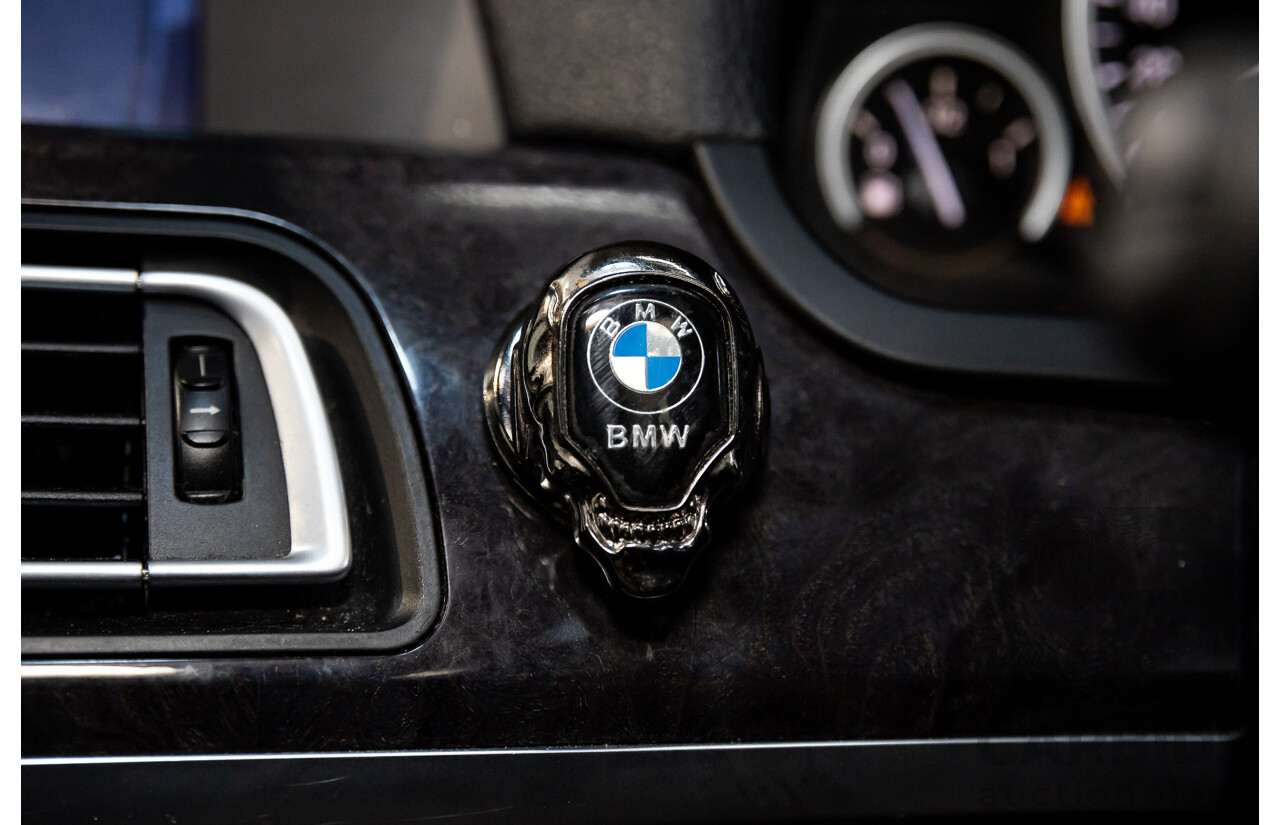2/2010 BMW 750i F01 4d Sedan Sapphire Black Metallic Twin Turbo V8 4.4L