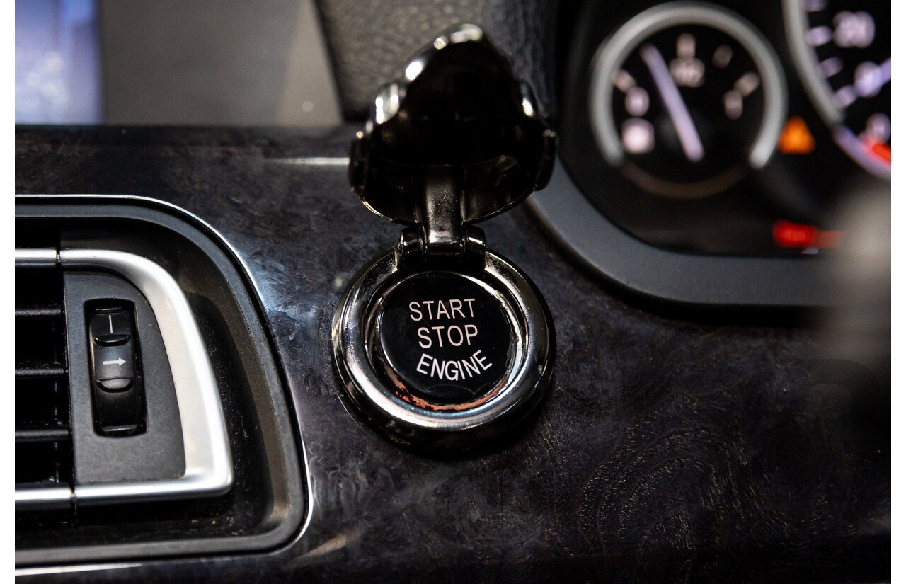 2/2010 BMW 750i F01 4d Sedan Sapphire Black Metallic Twin Turbo V8 4.4L