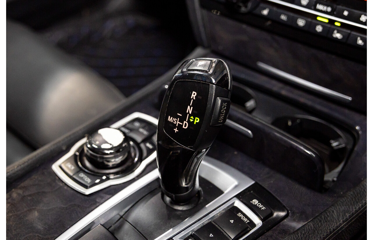 2/2010 BMW 750i F01 4d Sedan Sapphire Black Metallic Twin Turbo V8 4.4L