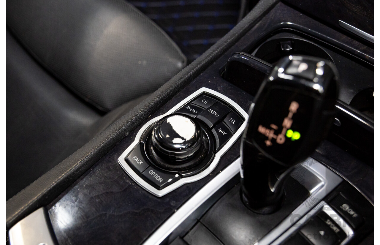 2/2010 BMW 750i F01 4d Sedan Sapphire Black Metallic Twin Turbo V8 4.4L