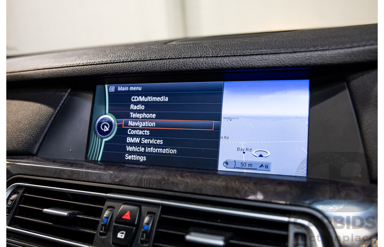 2/2010 BMW 750i F01 4d Sedan Sapphire Black Metallic Twin Turbo V8 4.4L
