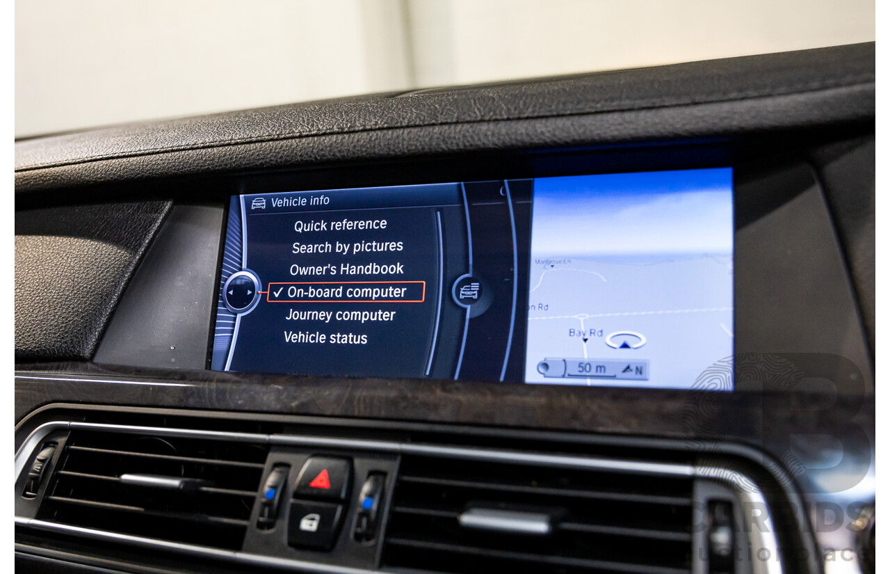 2/2010 BMW 750i F01 4d Sedan Sapphire Black Metallic Twin Turbo V8 4.4L