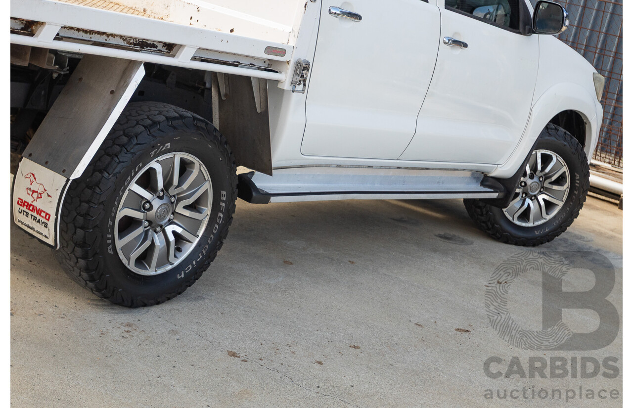 02/2013 Toyota Hilux SR5 (4x4) KUN26R MY12 Dual Cab Trayback Ute White 3.0L