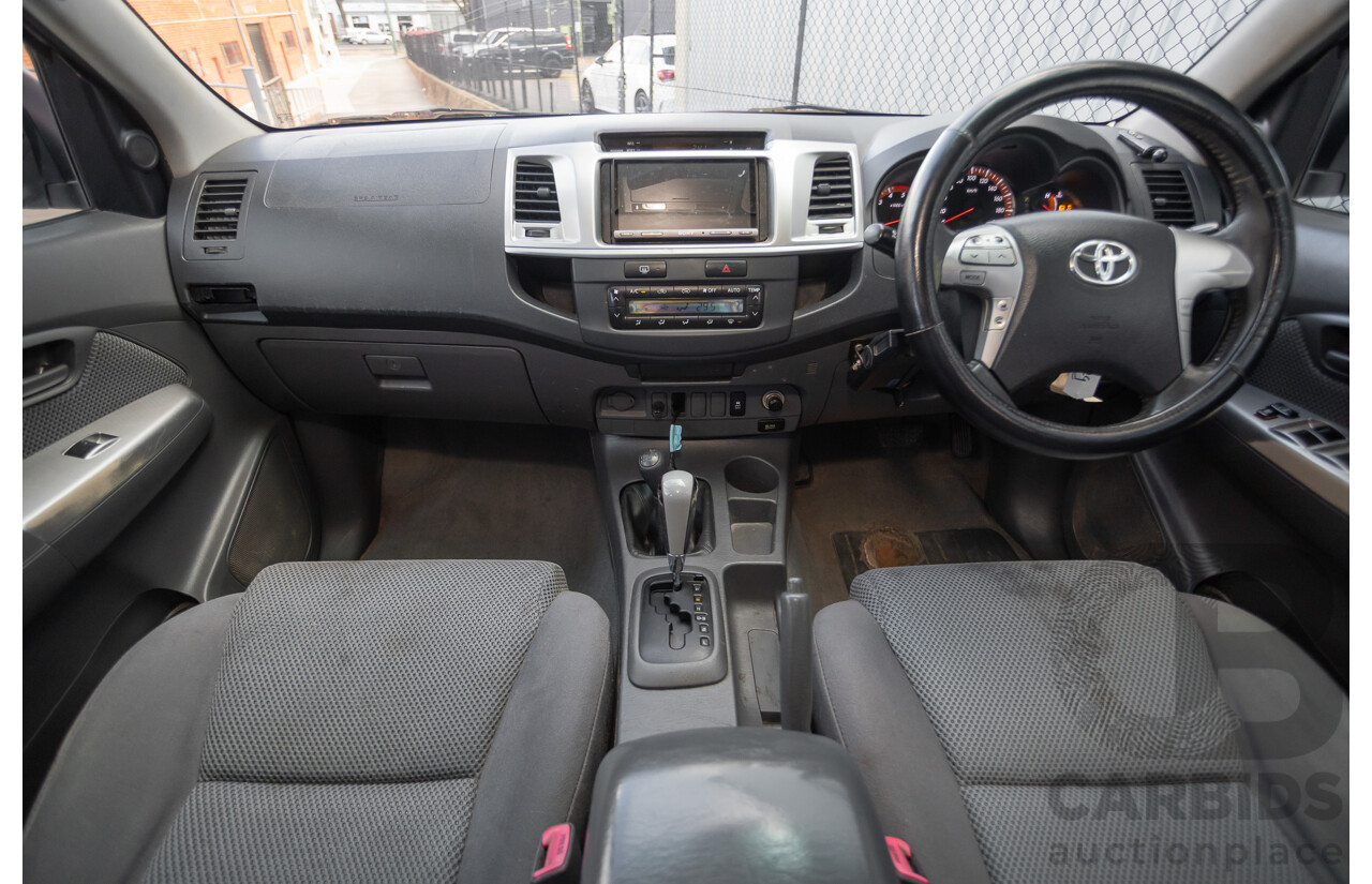 02/2013 Toyota Hilux SR5 (4x4) KUN26R MY12 Dual Cab Trayback Ute White 3.0L