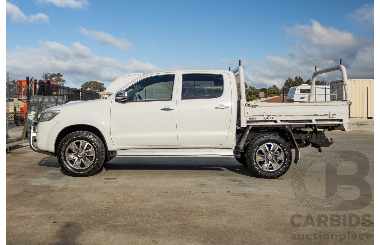 02/2013 Toyota Hilux SR5 (4x4) KUN26R MY12 Dual Cab Trayback Ute White 3.0L