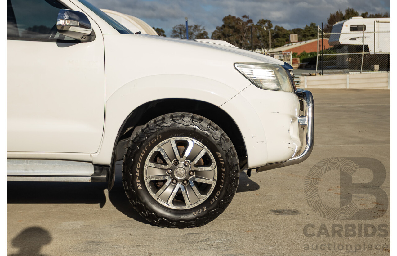 02/2013 Toyota Hilux SR5 (4x4) KUN26R MY12 Dual Cab Trayback Ute White 3.0L