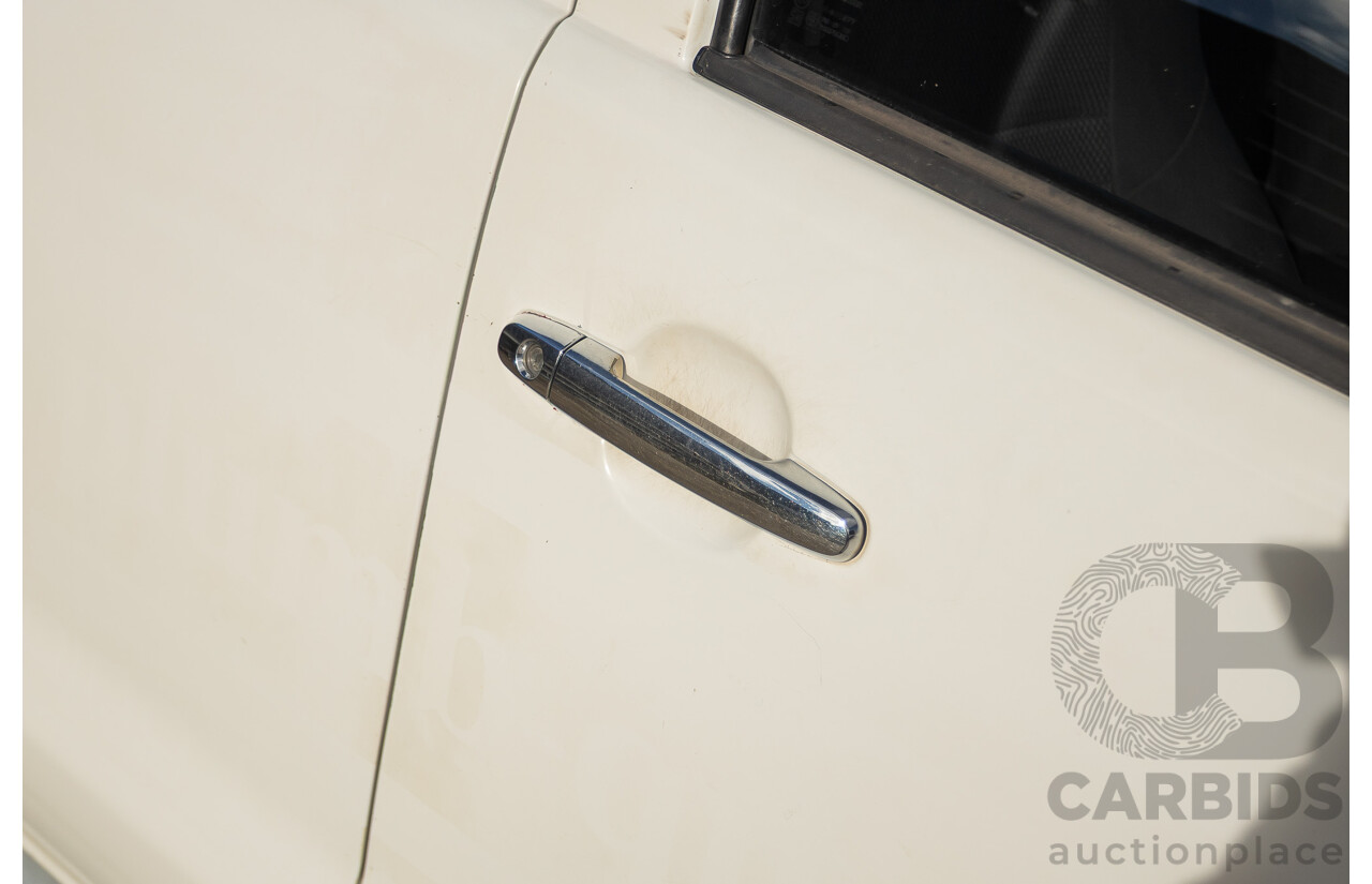 02/2013 Toyota Hilux SR5 (4x4) KUN26R MY12 Dual Cab Trayback Ute White 3.0L