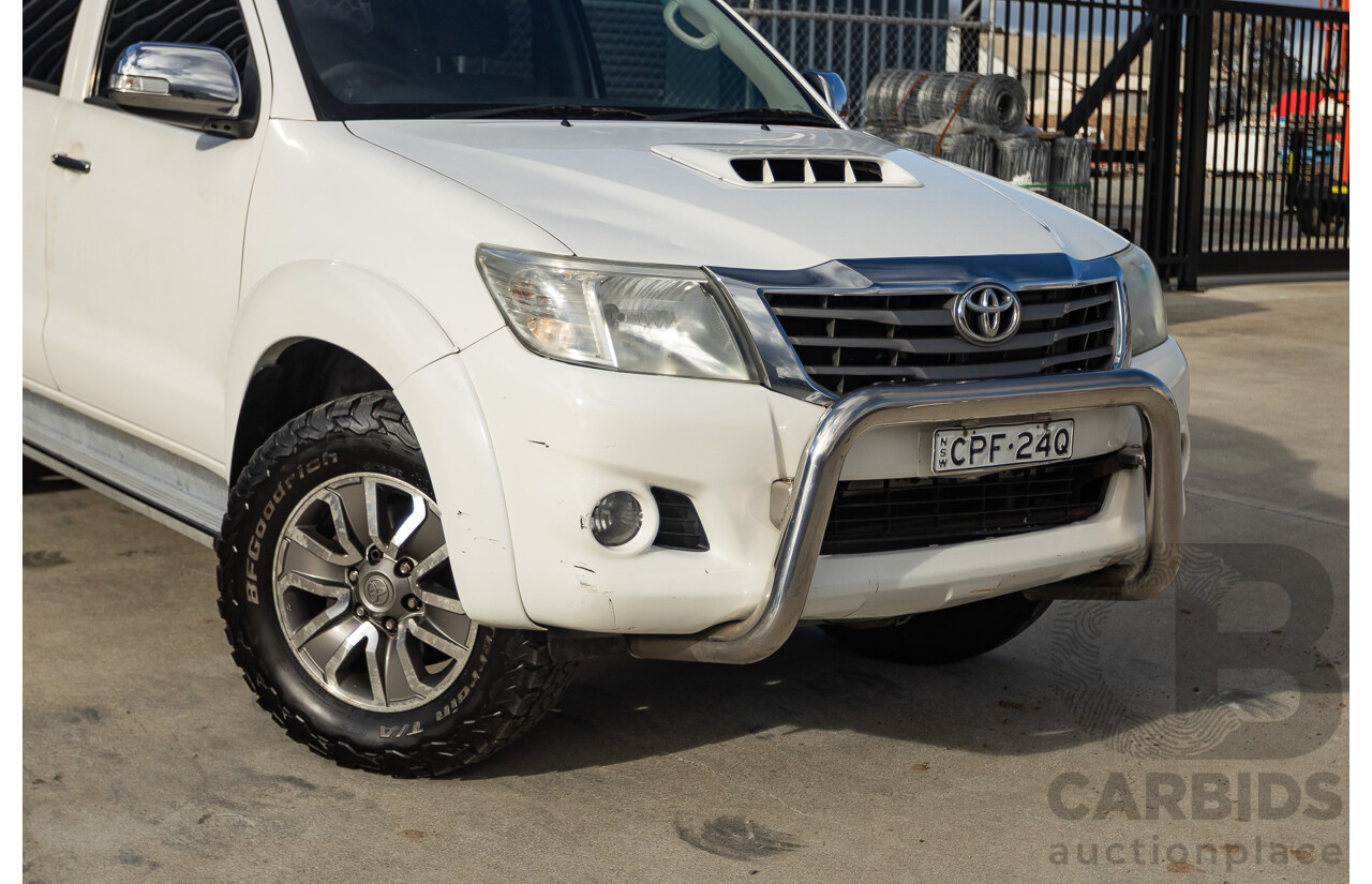 02/2013 Toyota Hilux SR5 (4x4) KUN26R MY12 Dual Cab Trayback Ute White 3.0L