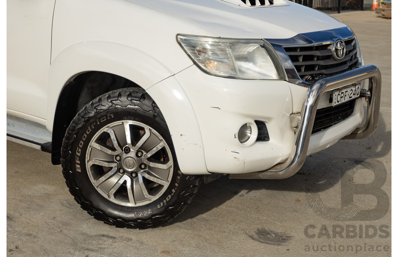 02/2013 Toyota Hilux SR5 (4x4) KUN26R MY12 Dual Cab Trayback Ute White 3.0L
