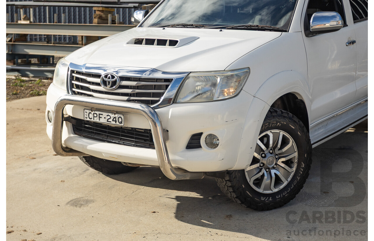 02/2013 Toyota Hilux SR5 (4x4) KUN26R MY12 Dual Cab Trayback Ute White 3.0L
