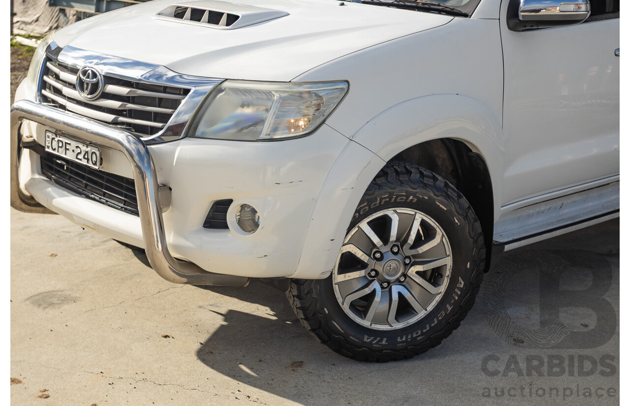 02/2013 Toyota Hilux SR5 (4x4) KUN26R MY12 Dual Cab Trayback Ute White 3.0L