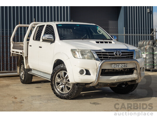 02/2013 Toyota Hilux SR5 (4x4) KUN26R MY12 Dual Cab Trayback Ute White 3.0L