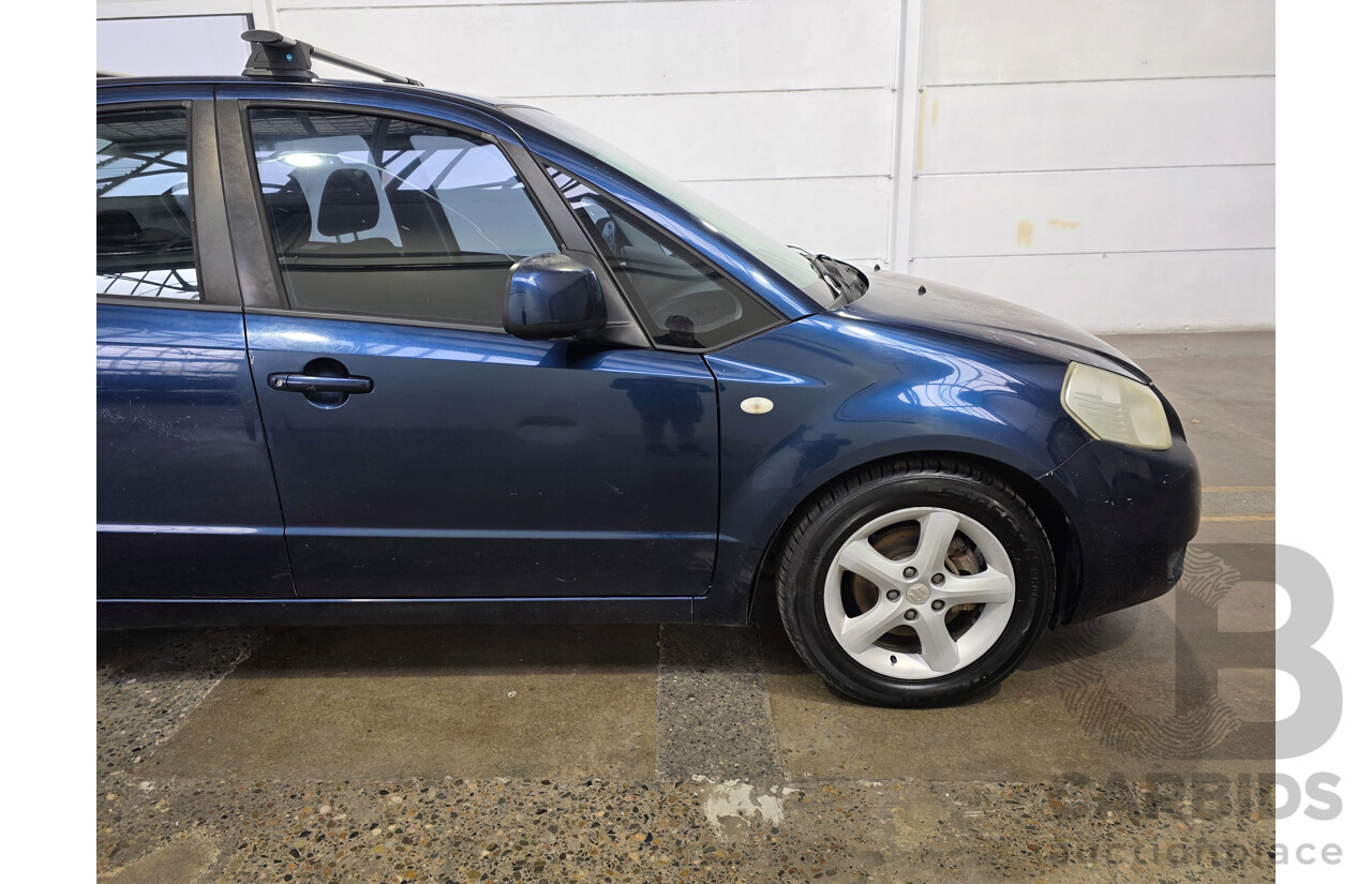 02/2009 Suzuki SX4 GY 4D Sedan Deep Sea Blue Metallic 2.0L
