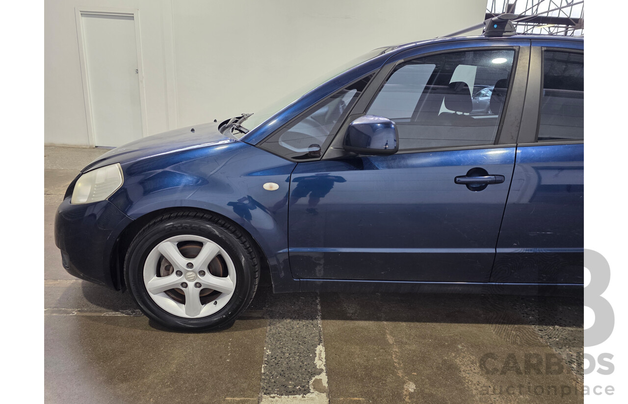 02/2009 Suzuki SX4 GY 4D Sedan Deep Sea Blue Metallic 2.0L