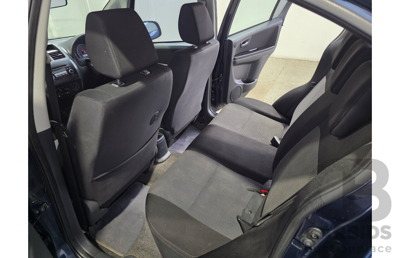 02/2009 Suzuki SX4 GY 4D Sedan Deep Sea Blue Metallic 2.0L