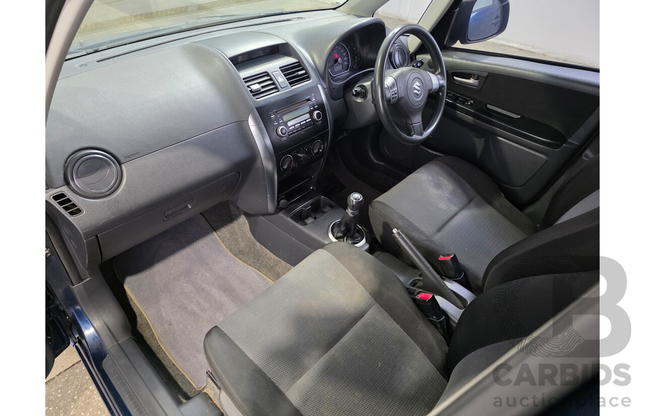02/2009 Suzuki SX4 GY 4D Sedan Deep Sea Blue Metallic 2.0L