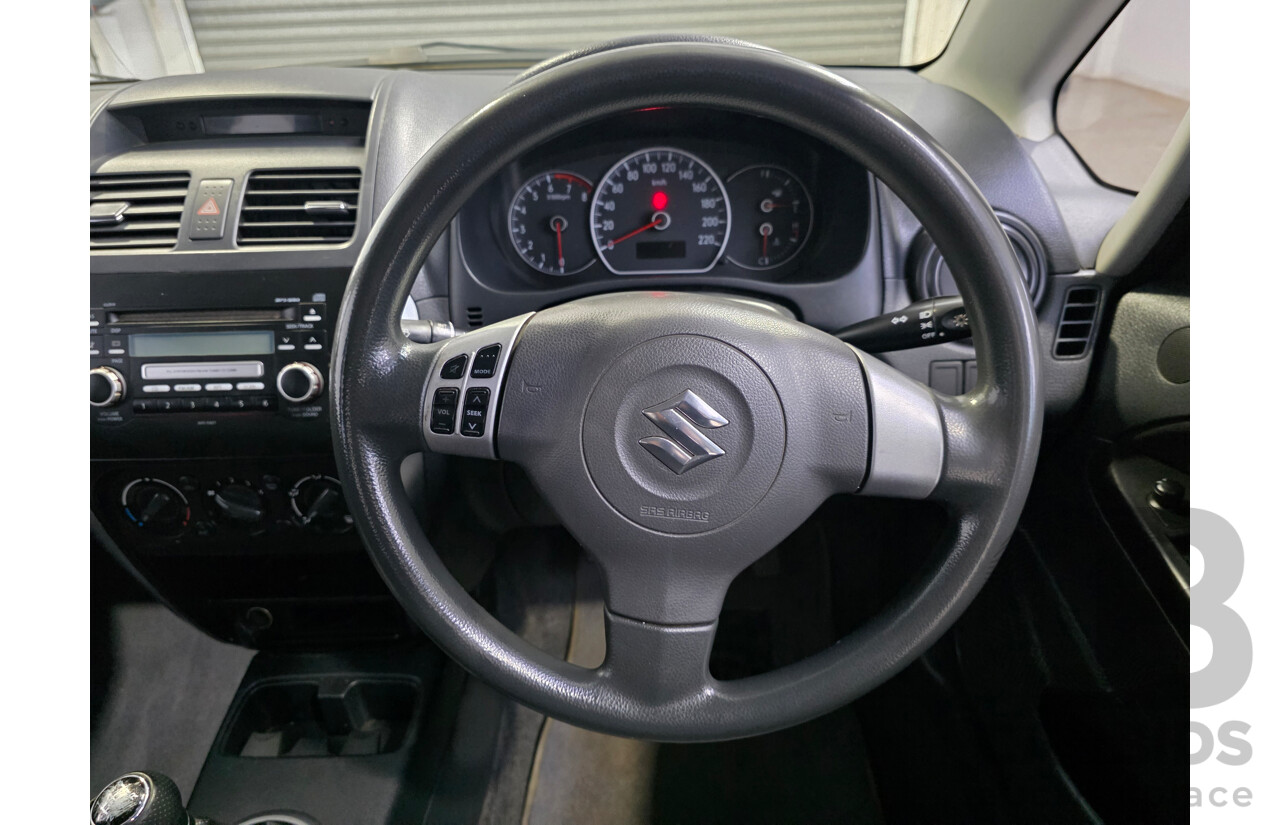 02/2009 Suzuki SX4 GY 4D Sedan Deep Sea Blue Metallic 2.0L