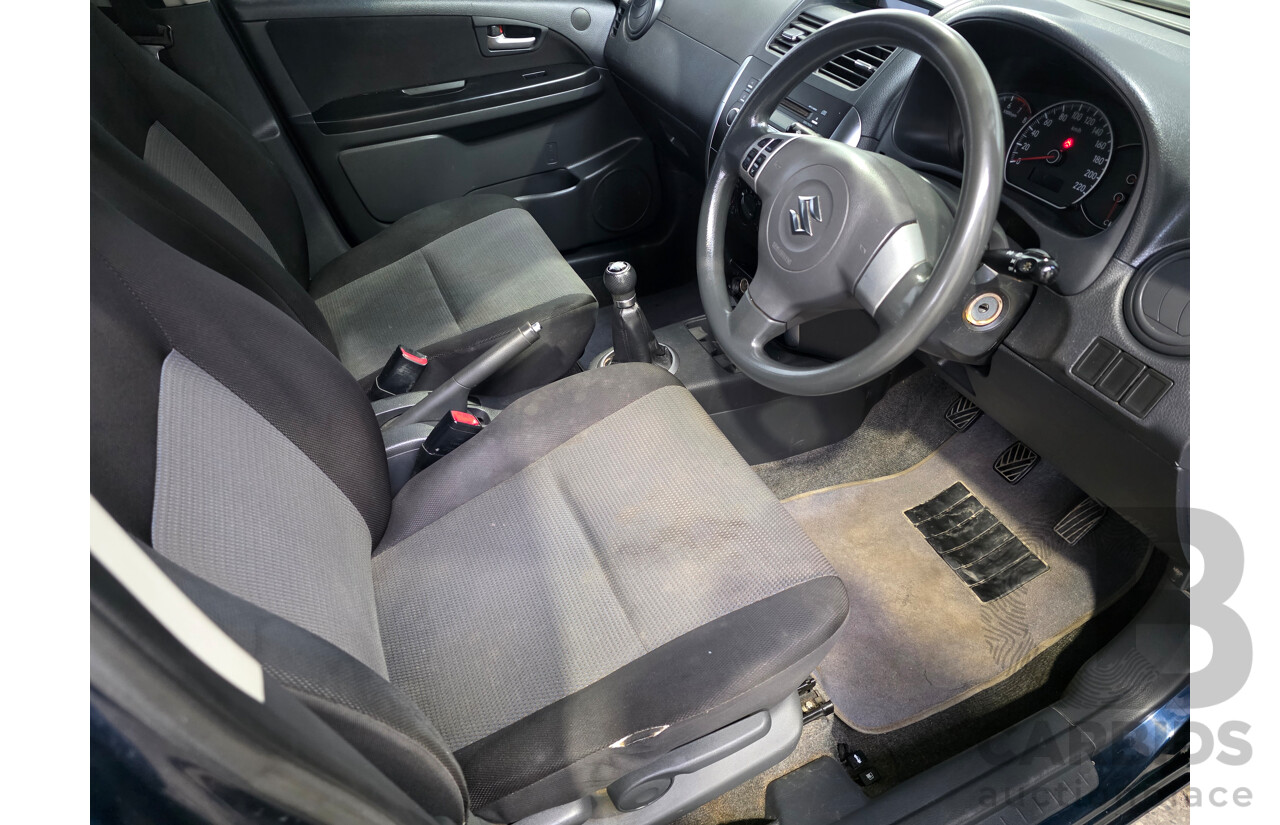 02/2009 Suzuki SX4 GY 4D Sedan Deep Sea Blue Metallic 2.0L