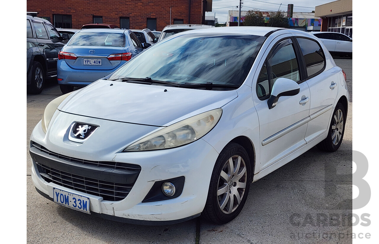 11/2010 Peugeot 207 Sportium MY10 5d Hatchback White 1.6L