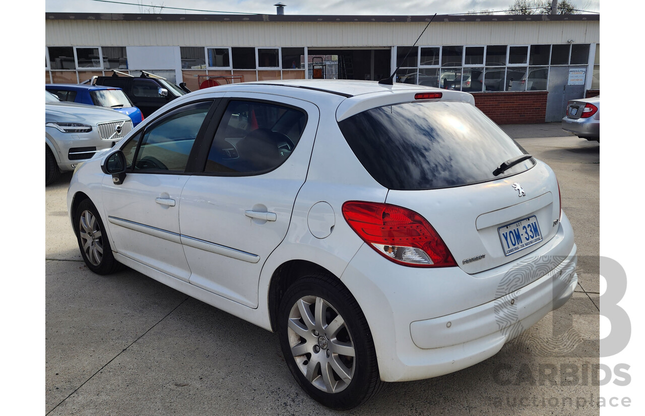 11/2010 Peugeot 207 Sportium MY10 5d Hatchback White 1.6L