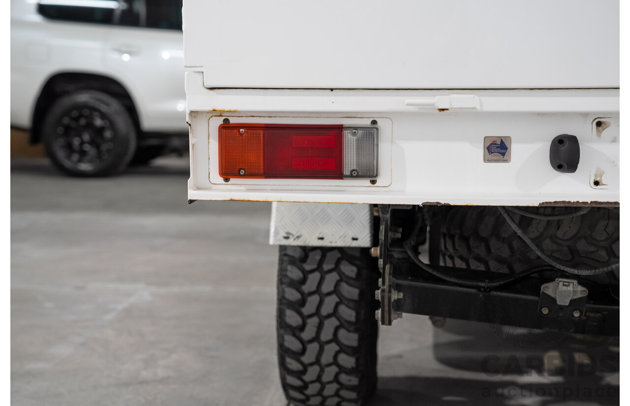 12/2022 Toyota Hilux SR (4x4) GUN126R Double C/Chas White Turbo Diesel 2.8L