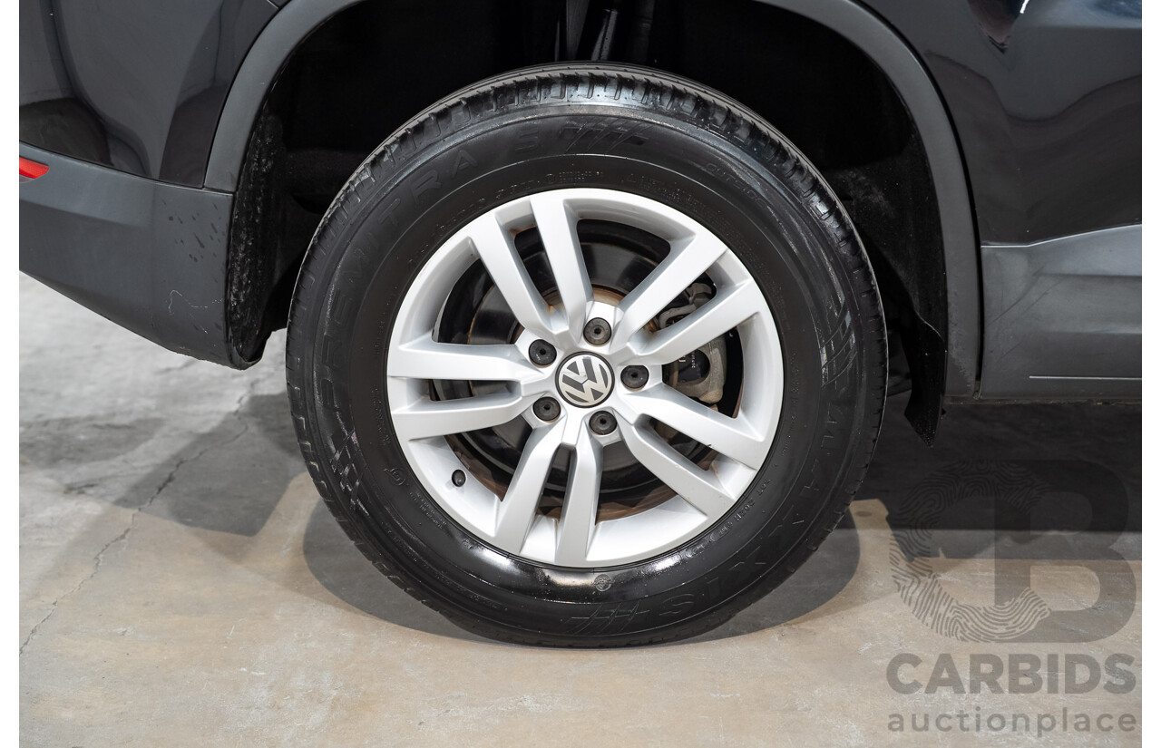 03/2016 Volkswagen Tiguan 118 TSI 5NC MY16 4D Wagon Deep Pearl Black Metallic Twincharged 1.4L