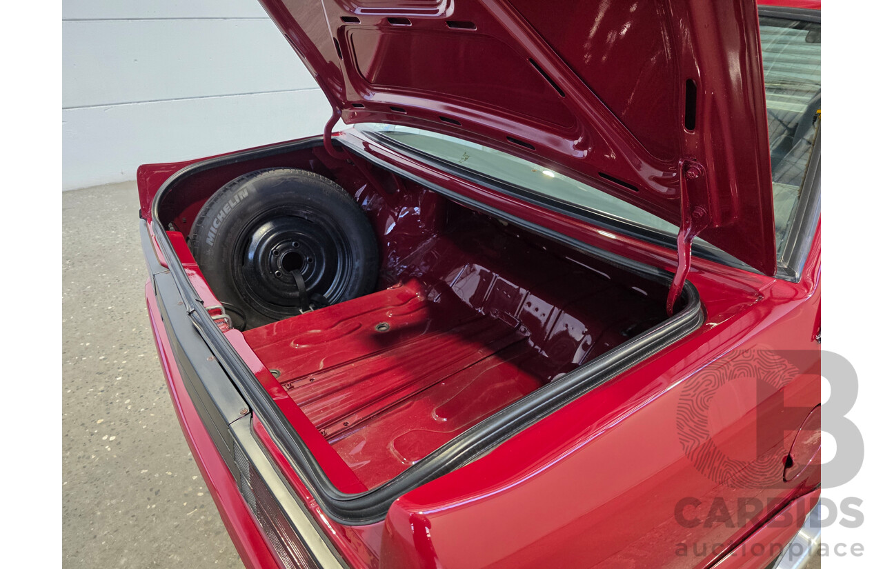 04/1987 Holden VL Commodore Executive 4d Sedan Burgundy V8 5.0L - Modified