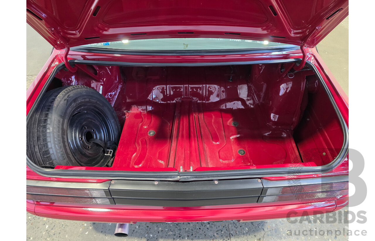 04/1987 Holden VL Commodore Executive 4d Sedan Burgundy V8 5.0L - Modified