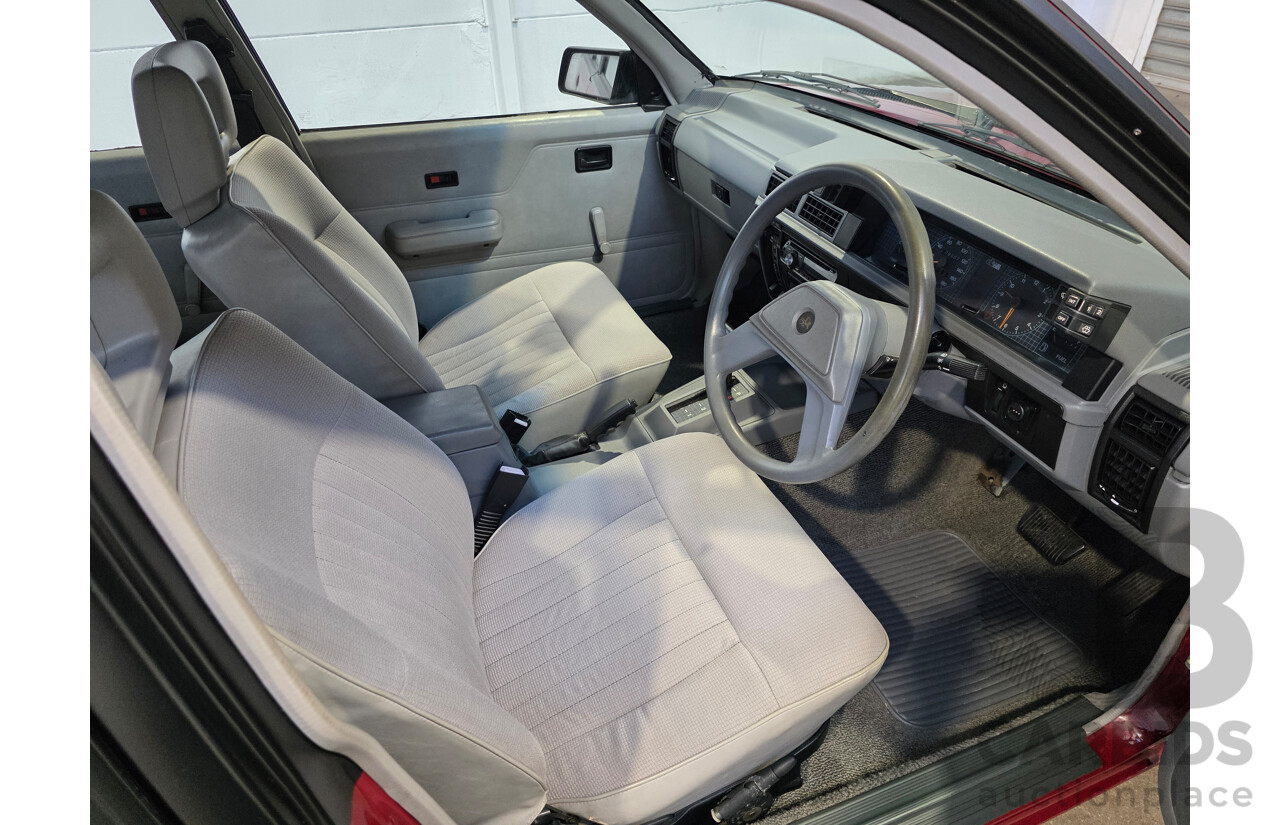 04/1987 Holden VL Commodore Executive 4d Sedan Burgundy V8 5.0L - Modified