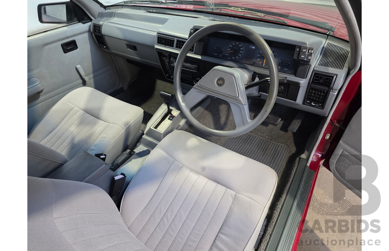 04/1987 Holden VL Commodore Executive 4d Sedan Burgundy V8 5.0L - Modified