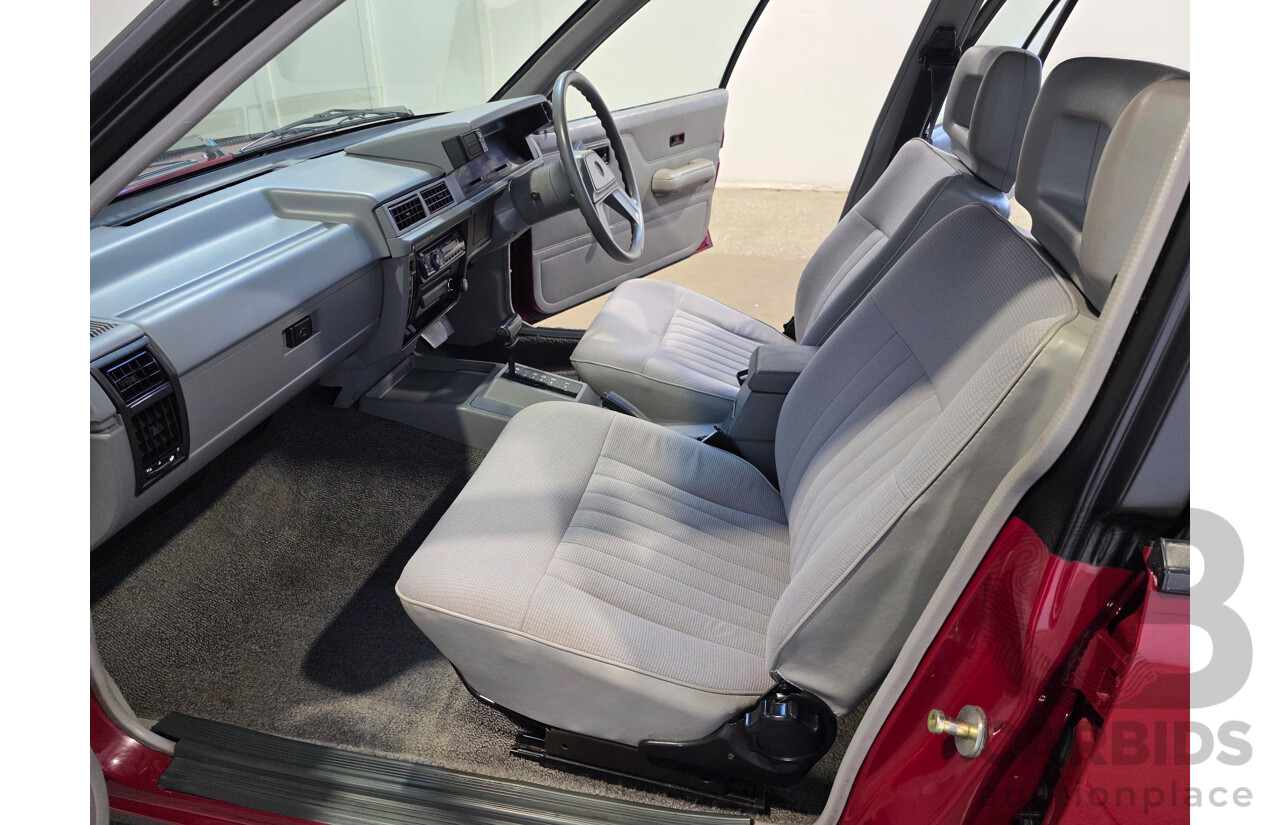 04/1987 Holden VL Commodore Executive 4d Sedan Burgundy V8 5.0L - Modified