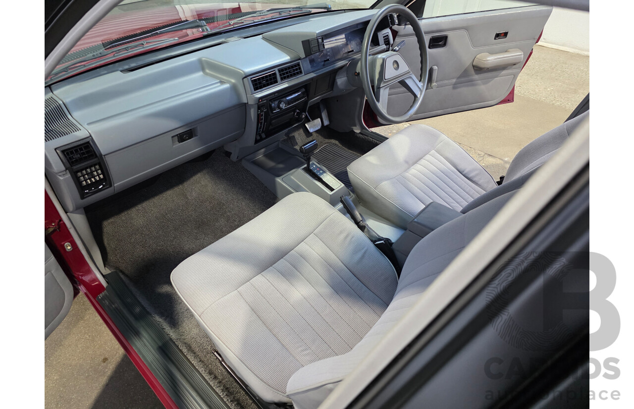 04/1987 Holden VL Commodore Executive 4d Sedan Burgundy V8 5.0L - Modified