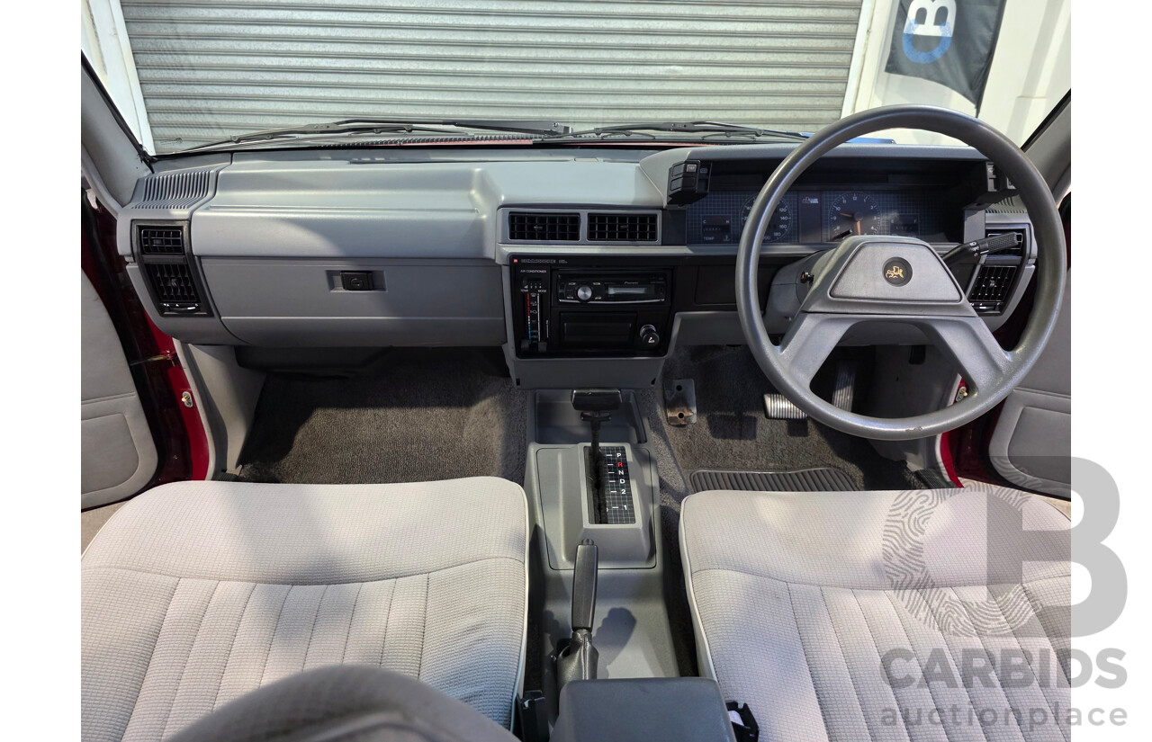 04/1987 Holden VL Commodore Executive 4d Sedan Burgundy V8 5.0L - Modified