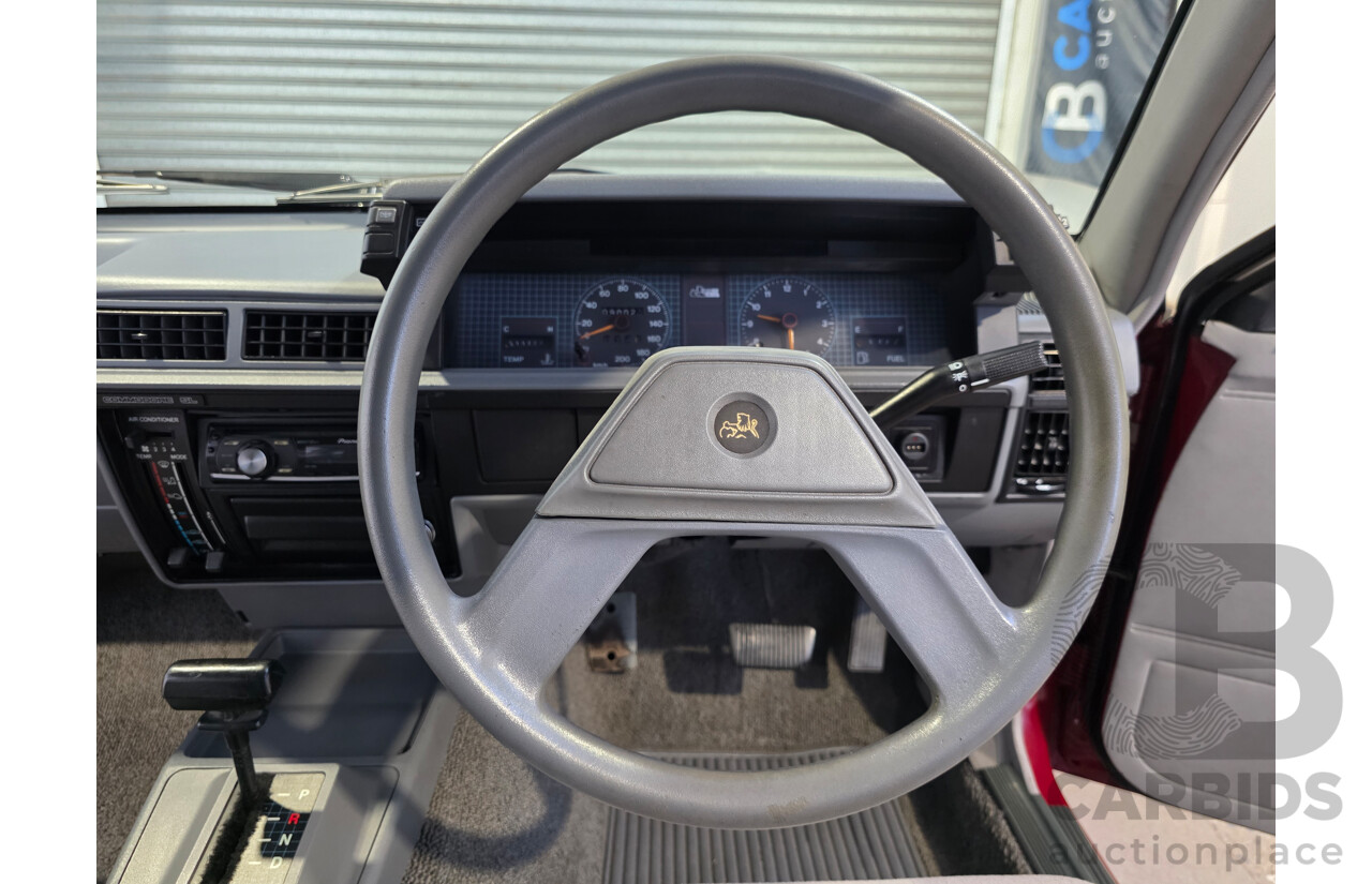 04/1987 Holden VL Commodore Executive 4d Sedan Burgundy V8 5.0L - Modified