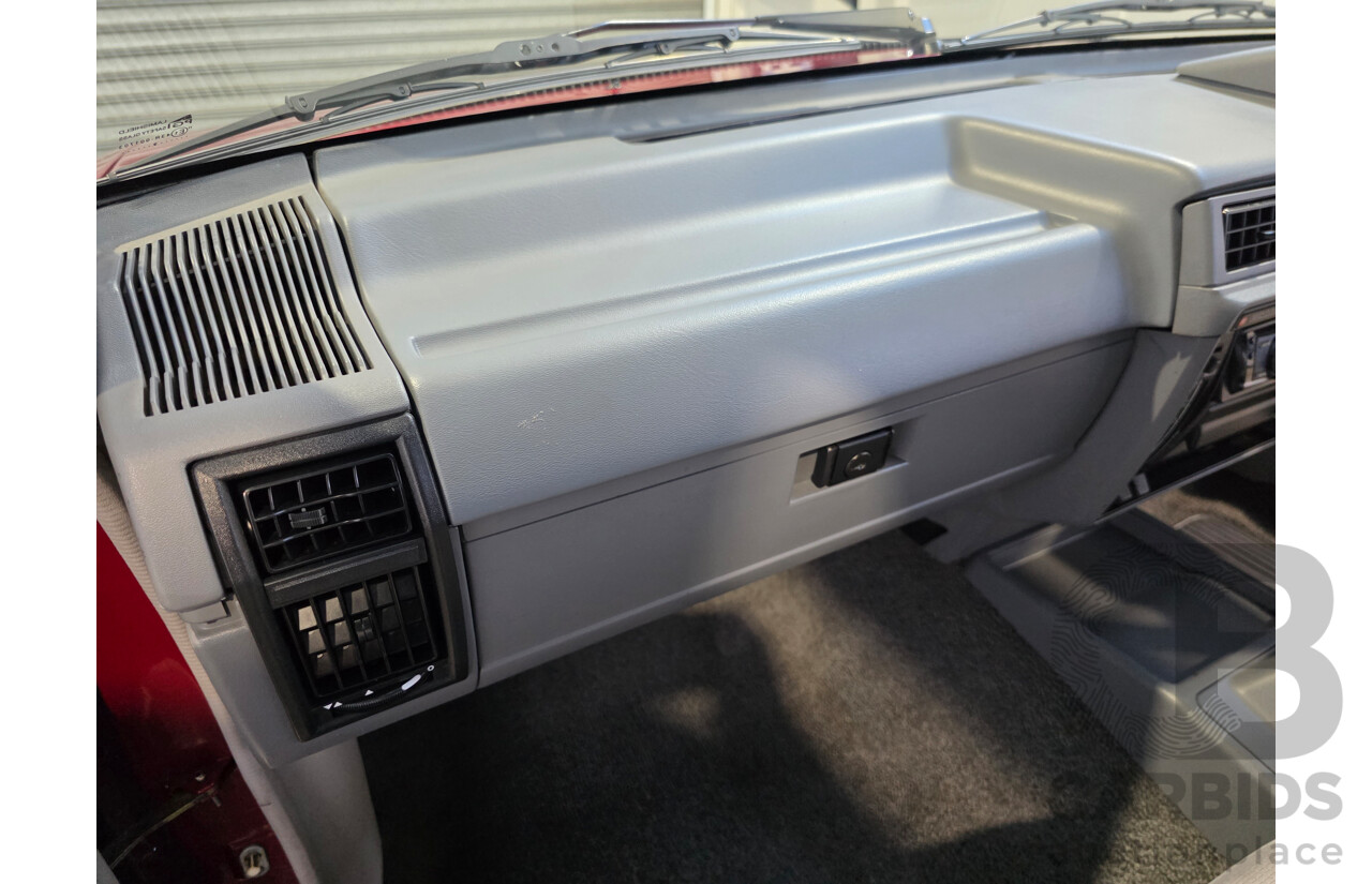 04/1987 Holden VL Commodore Executive 4d Sedan Burgundy V8 5.0L - Modified
