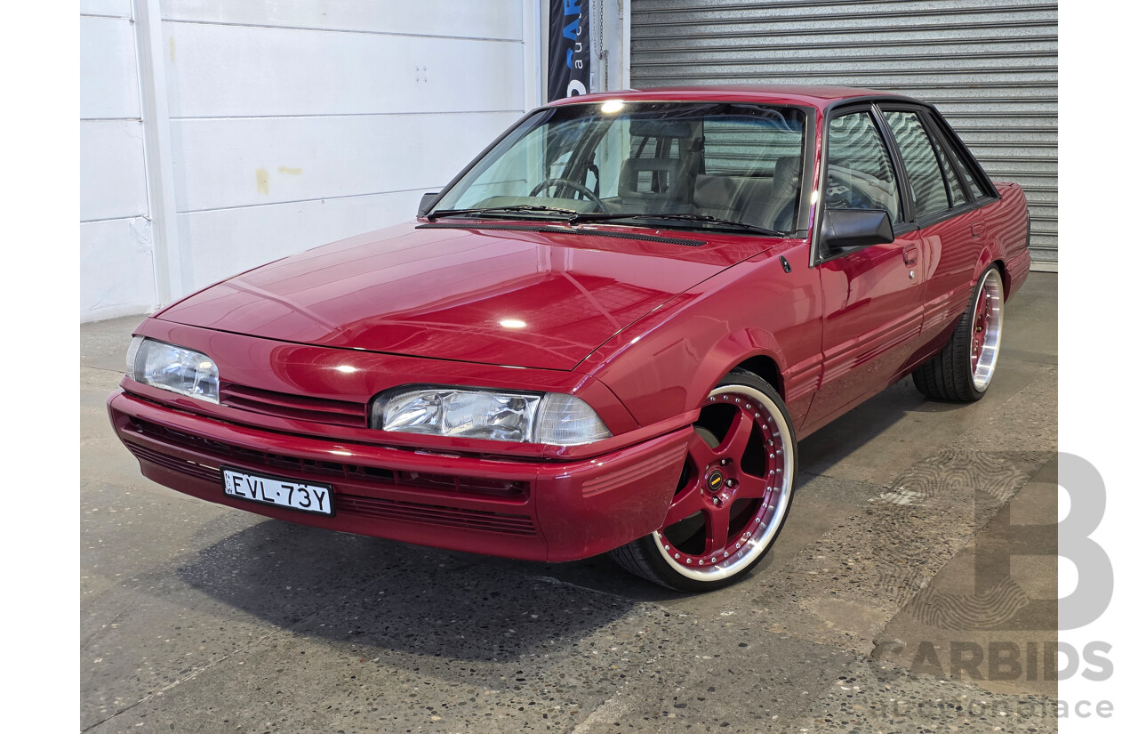 04/1987 Holden VL Commodore Executive 4d Sedan Burgundy V8 5.0L - Modified