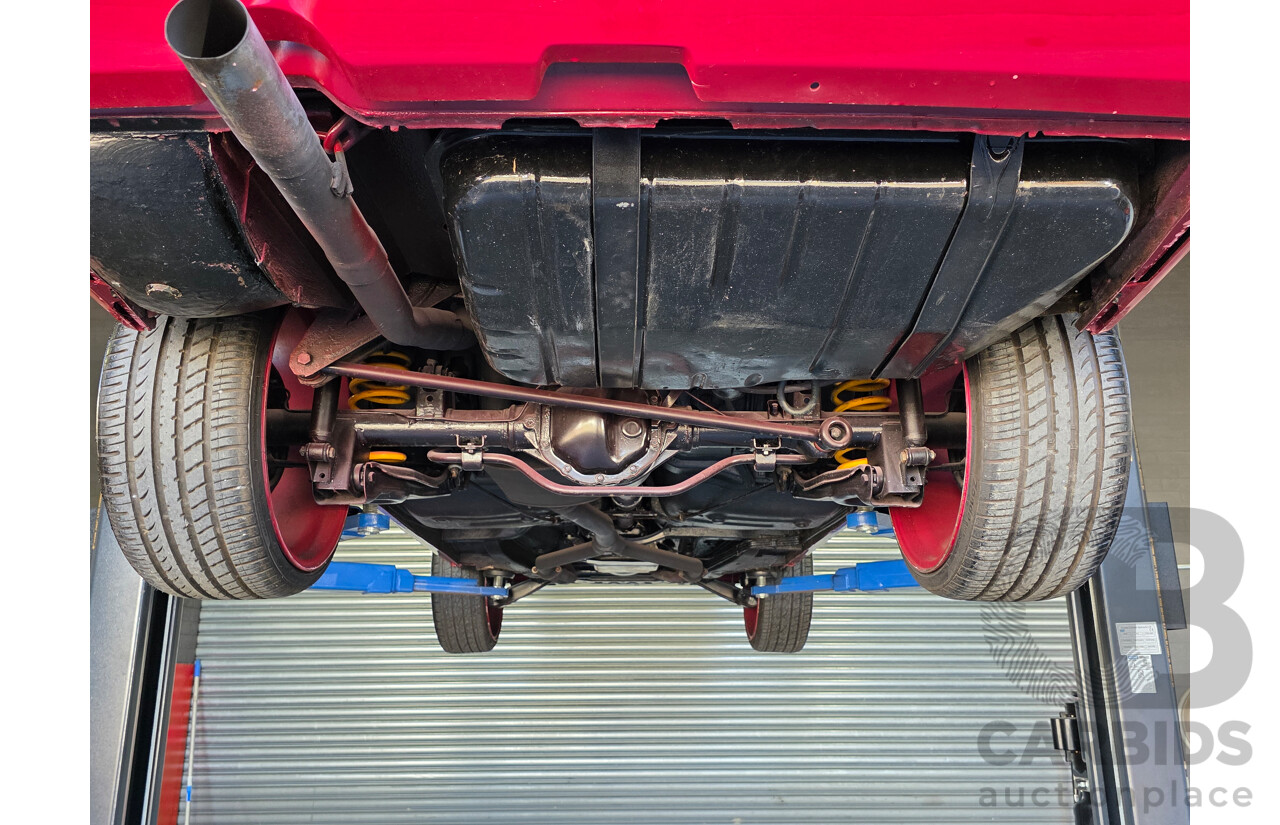 04/1987 Holden VL Commodore Executive 4d Sedan Burgundy V8 5.0L - Modified