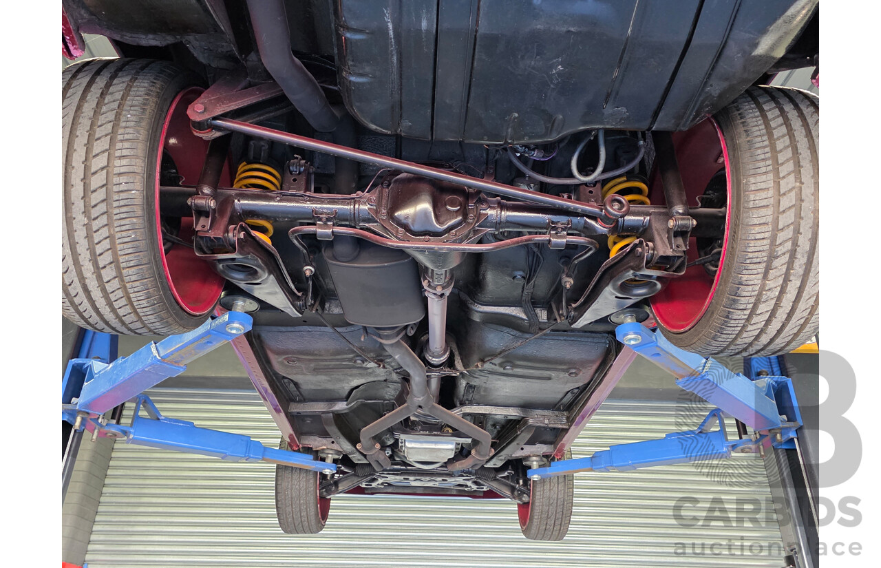 04/1987 Holden VL Commodore Executive 4d Sedan Burgundy V8 5.0L - Modified