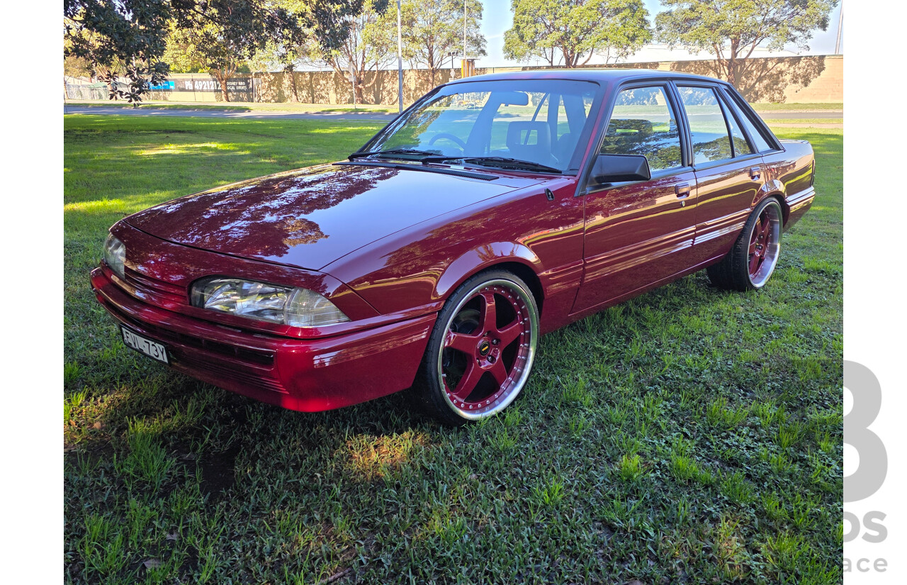 04/1987 Holden VL Commodore Executive 4d Sedan Burgundy V8 5.0L - Modified