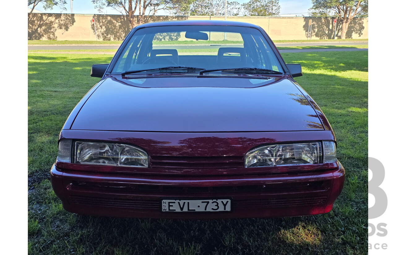 04/1987 Holden VL Commodore Executive 4d Sedan Burgundy V8 5.0L - Modified