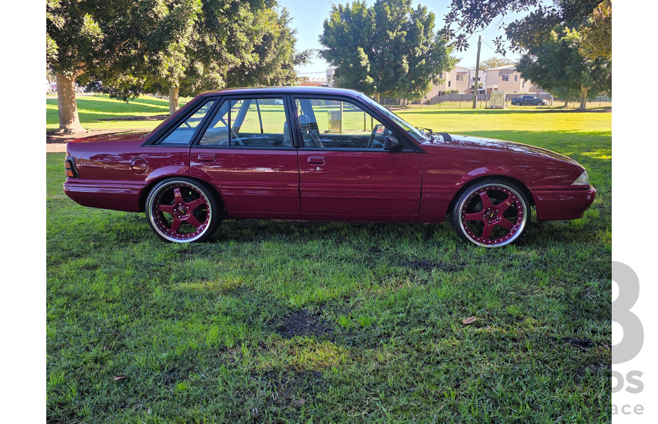 04/1987 Holden VL Commodore Executive 4d Sedan Burgundy V8 5.0L - Modified