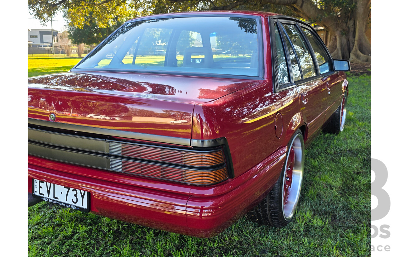 04/1987 Holden VL Commodore Executive 4d Sedan Burgundy V8 5.0L - Modified