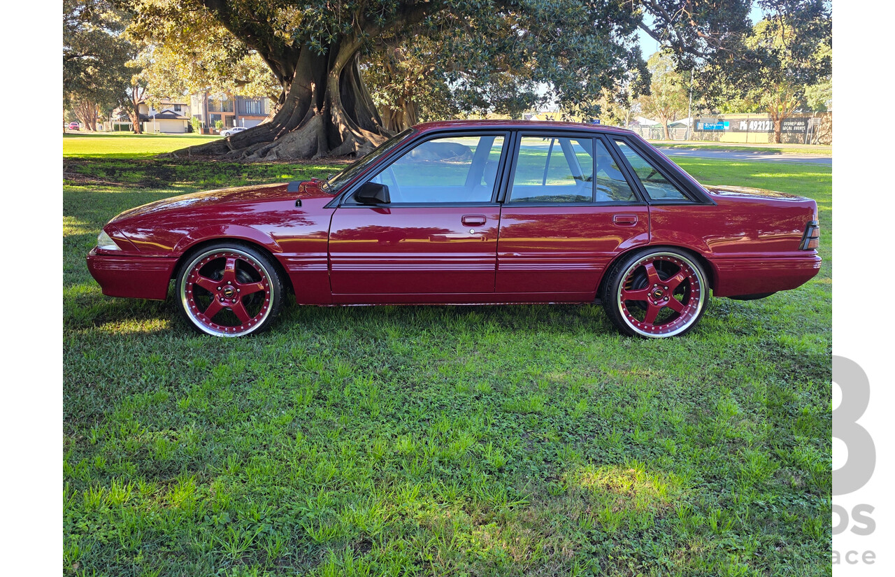04/1987 Holden VL Commodore Executive 4d Sedan Burgundy V8 5.0L - Modified