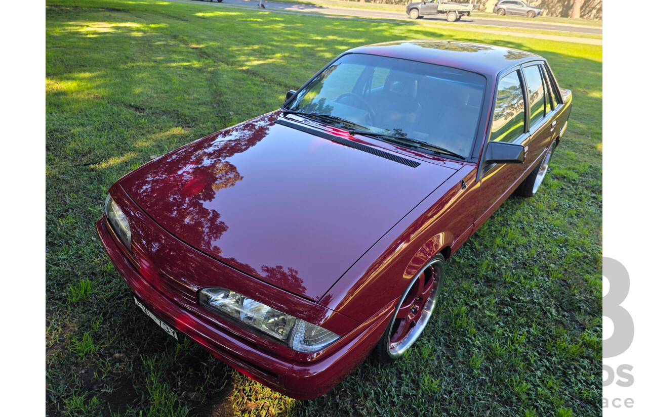 04/1987 Holden VL Commodore Executive 4d Sedan Burgundy V8 5.0L - Modified