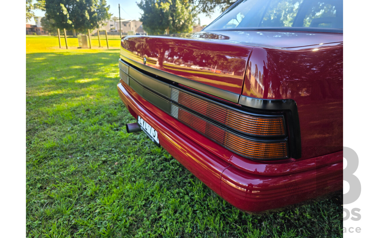 04/1987 Holden VL Commodore Executive 4d Sedan Burgundy V8 5.0L - Modified