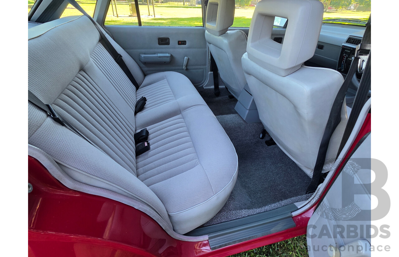 04/1987 Holden VL Commodore Executive 4d Sedan Burgundy V8 5.0L - Modified