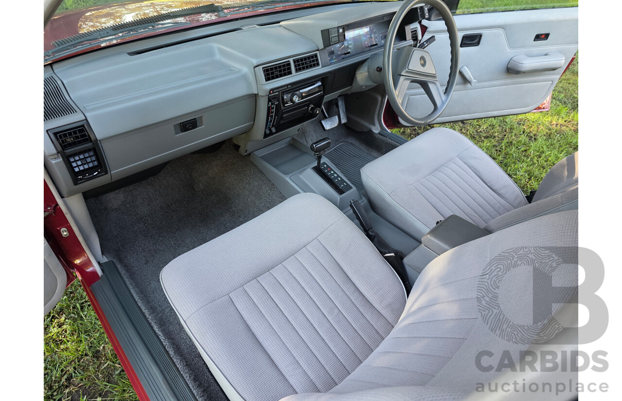04/1987 Holden VL Commodore Executive 4d Sedan Burgundy V8 5.0L - Modified
