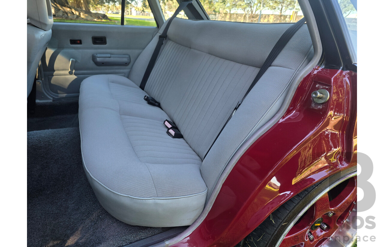 04/1987 Holden VL Commodore Executive 4d Sedan Burgundy V8 5.0L - Modified