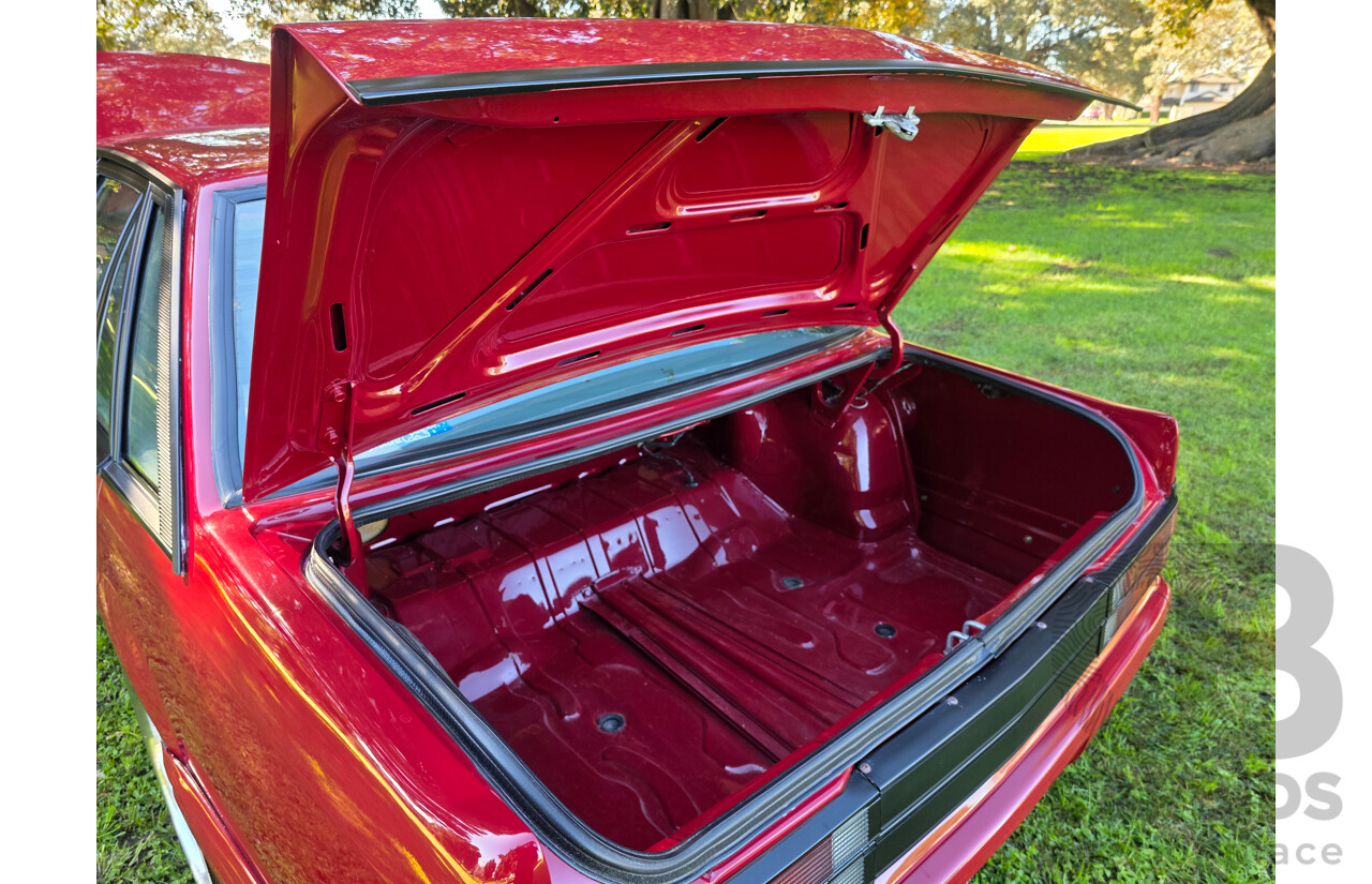 04/1987 Holden VL Commodore Executive 4d Sedan Burgundy V8 5.0L - Modified