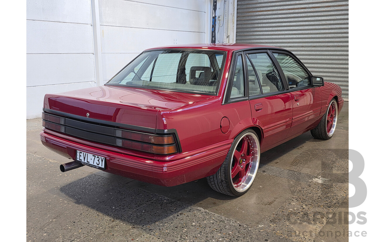 04/1987 Holden VL Commodore Executive 4d Sedan Burgundy V8 5.0L - Modified